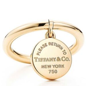 Auth Return  to Tiffany 18k Gold Circle Tag Ring.